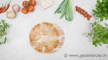 Met dit alledaagse keukengereedschap snijd je een pizza veel makkelijker