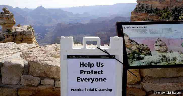 Tourists enter reopened Grand Canyon despite virus concerns
