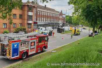 Woman taken to hospital after Audi hits tree
