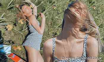 Candice Swanepoel shows off her stunning figure while soaking in the sun in a field of flowers 