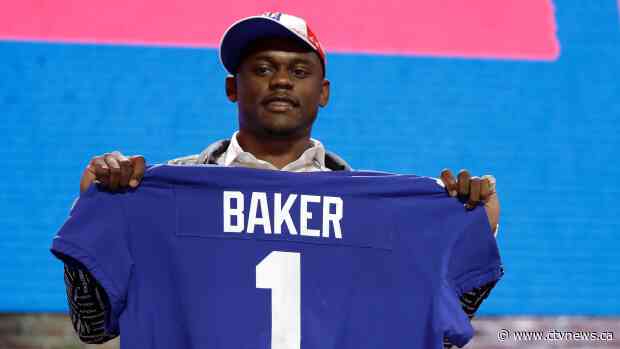 Giants DB Baker surrenders to police in armed robbery case