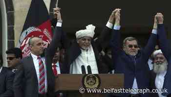 Afghan president and rival agree power-sharing deal
