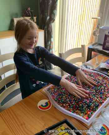 Girl raises £1,600 for Warrington Hospital making rainbows