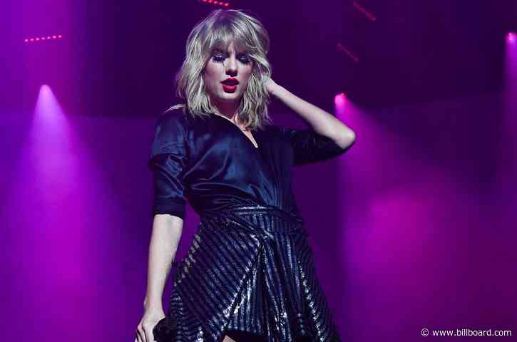 Taylor Swift Shows Off Pink & Blue Hair in Sunny Snapshots Ahead of ‘City of Lover’ Concert Special