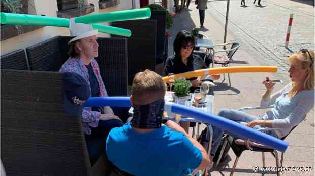 German cafe gives customers pool noodle-hats to ensure they remain physically distant