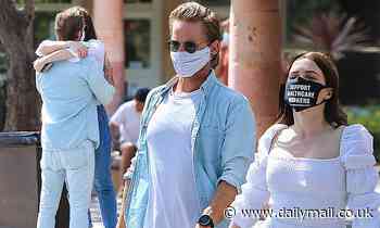 One Tree Hill alum Sophia Bush embraces blond mystery man during hand-in-hand, masked Malibu stroll