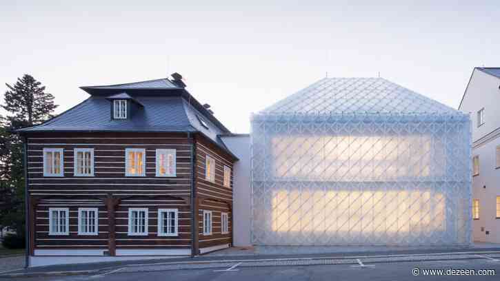 Translucent glass house built alongside historic buildings for Lasvit's Czech Republic headquarters