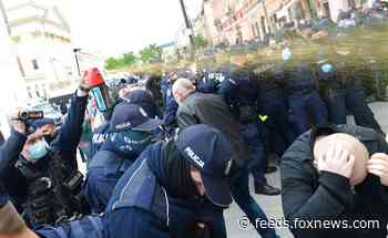 Anti-lockdown protests break out in London, Warsaw, other European cities as coronavirus shutdowns linger