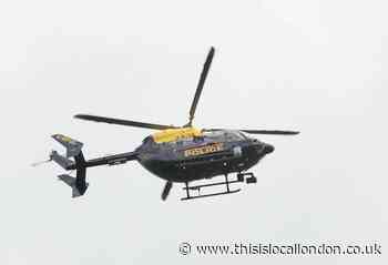 Armed police and helicopter respond to man with knife in Eltham