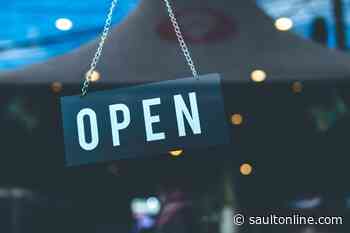Some businesses take first, cautious steps to reopening after long weekend