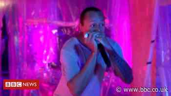 Coronavirus lockdown: The harmonica player giving cheer to neighbours