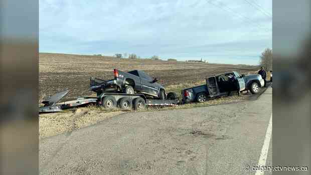 Innisfail RCMP arrest 2 after stolen trailer hauling stolen truck jackknifes into ditch