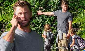 Now that's an Extraction! Chris Hemsworth picks up his three children after school in Byron Bay - Daily Mail