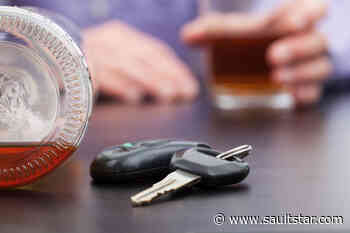 Driver found sleeping, charged with impaired