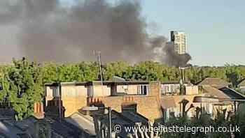 Firefighters tackle blaze at block of flats in south-east London