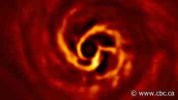 Telescope sees 'baby planet' forming around distant star