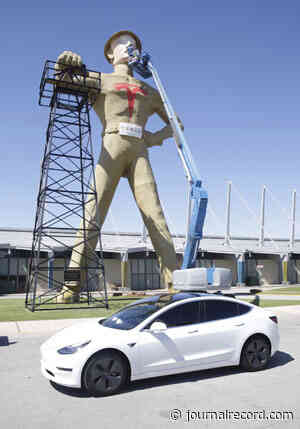 Golden Driller statue gets Tesla-style makeover