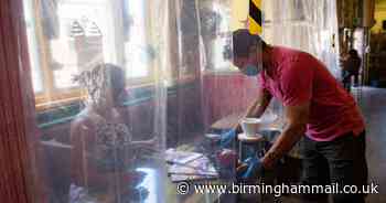 Worcester café boss hangs shower curtains to protect customers from coronavirus