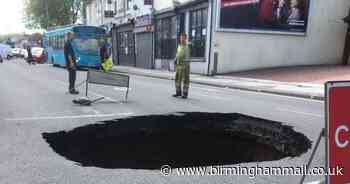 Live updates as massive sinkhole appears in middle of road