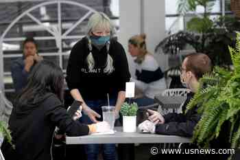 Towns Eye Reopening Beaches; CVS Returns Fed Pandemic Funds - U.S. News & World Report