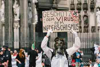 A pandemic of conspiracy theories spreads across the internet and around the world