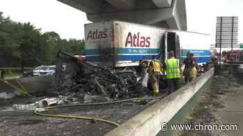 Big rig bursts into flames along North Freeway, driver burned