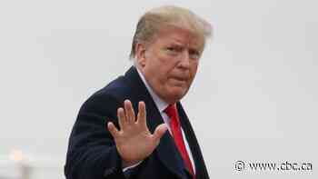 Trump tours Michigan factory to tout medical devices without a mask