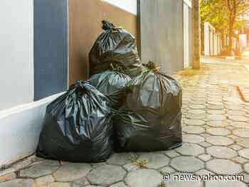 A family found nearly $1 million in cash stuffed into sacks in the middle of a road