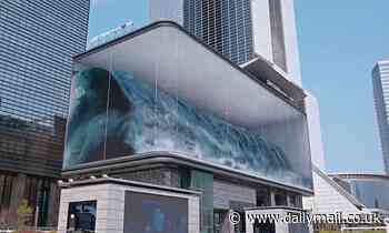 Giant 3D wave breaks over Seoul's Gangnam District every hour on a 262ft wide digital billboard