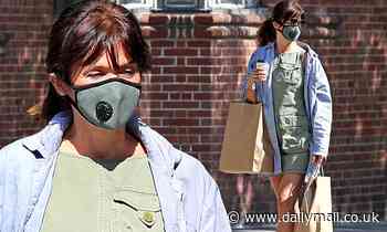 Victoria's Secret model Helena Christensen, 51, wears a green minidress