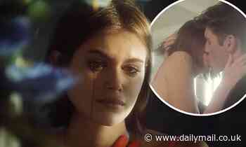 Kaia Gerber locks lips with actor Gregg Sulkin in tearful music video directed by Cara Delevingne