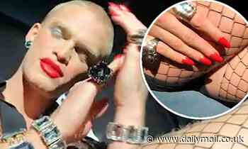 Miley Cyrus dresses up beau Cody Simpson in fishnets and red lipstick during directorial debut