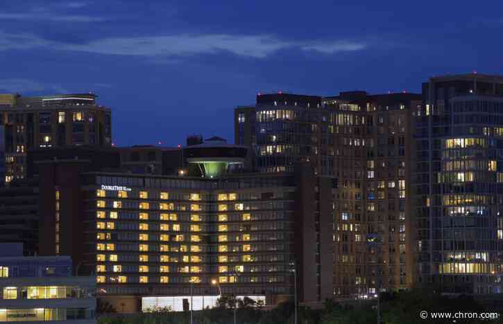 Virginia hotel uses empty rooms to illuminate messages of hope for commuters