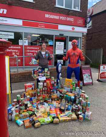 Superhero lends a hand to food bank in York