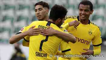 Jadon Sancho shines from bench as Borussia Dortmund keep up title tilt