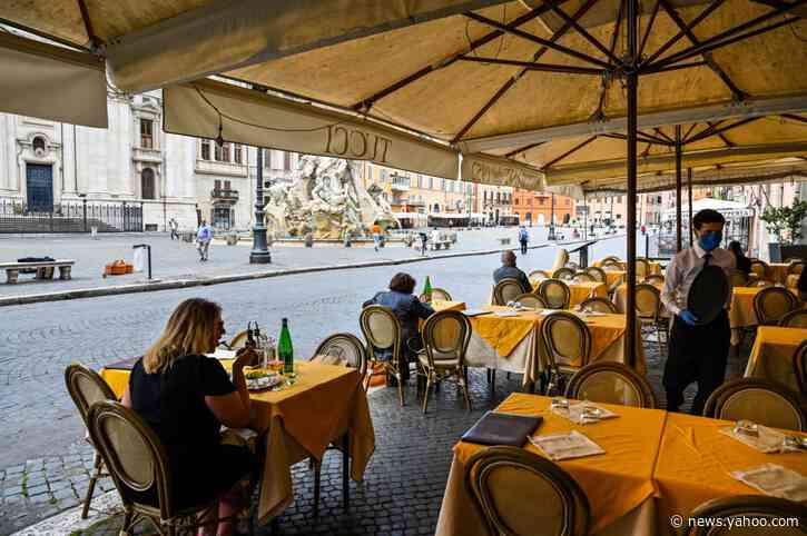Italy's restaurants, shops caught between rock and hard place
