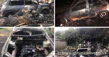 Dramatic pictures show burnt out shell of cars torched in suspected arson attack