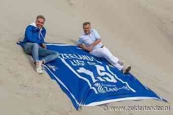 De oplossing op het strand: de anderhalvemeterhanddoek