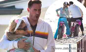 Paris Hilton snuggles up to boyfriend Carter Reum on romantic Malibu outing