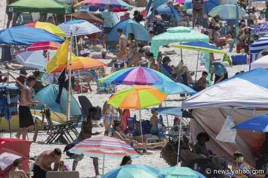 Beach and party crowds across US break social distancing rules over Memorial Day weekend