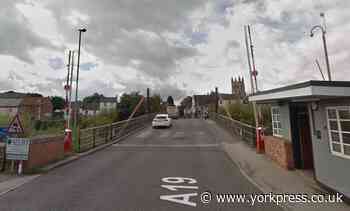 Firefighters and police rescue person from Selby toll bridge