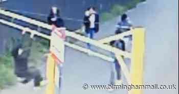 Fury as youths spotted spitting and vandalising social distancing sign