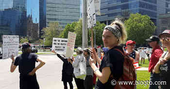 Latest protest at Queen's Park in Toronto included a march and people licking statues - blogTO