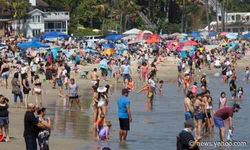 Large crowds gather for Memorial Day as US braces to surpass 100,000 deaths