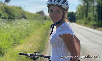 Geri Horner enjoys an idyllic day in the countryside as she goes for a bike ride near her home