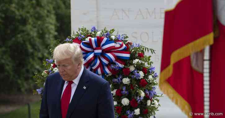 Trump honors war dead in Memorial Day events colored by pandemic’s threat