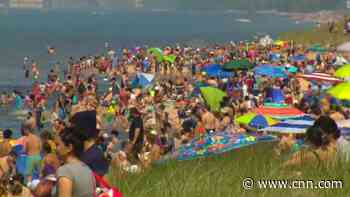 Photos show plenty of people flocked to beaches, but not a lot of social distancing or masks during the holiday weekend