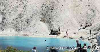 Swimmers flock to 'toxic' blue lagoon despite dead animal and faeces warning