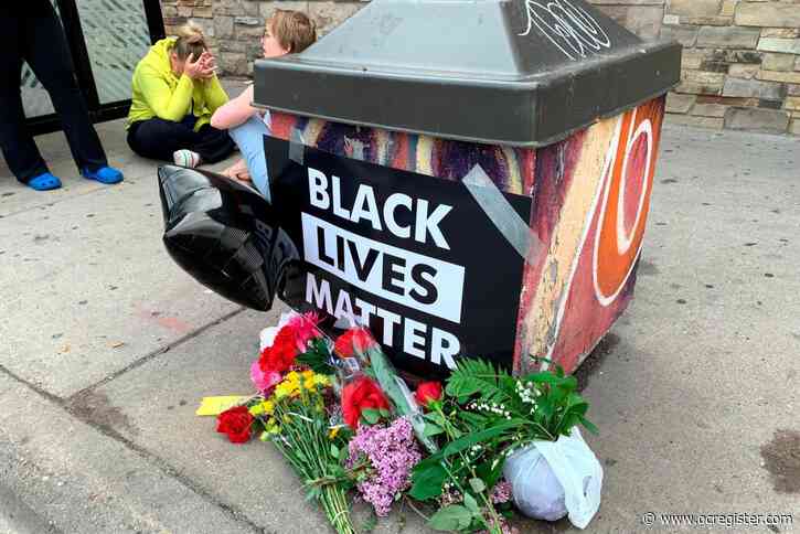 Black man dies after video shows officer kneeling on neck