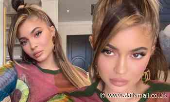 Kylie Jenner admires her cosmetics prowess as she shares sultry selfie
